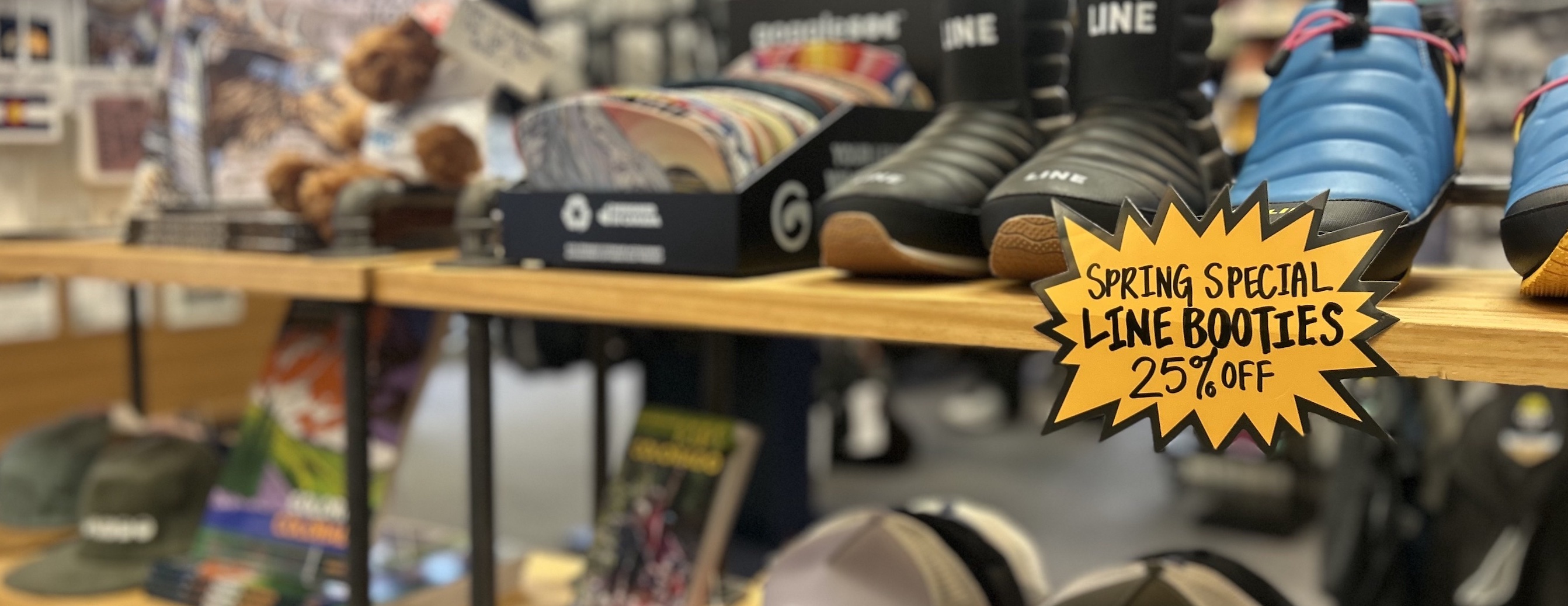 Retail rack with "Spring Special" sale sign