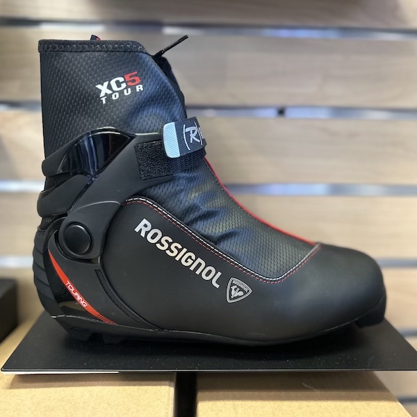 Classic touring cross-country boot on retail display.