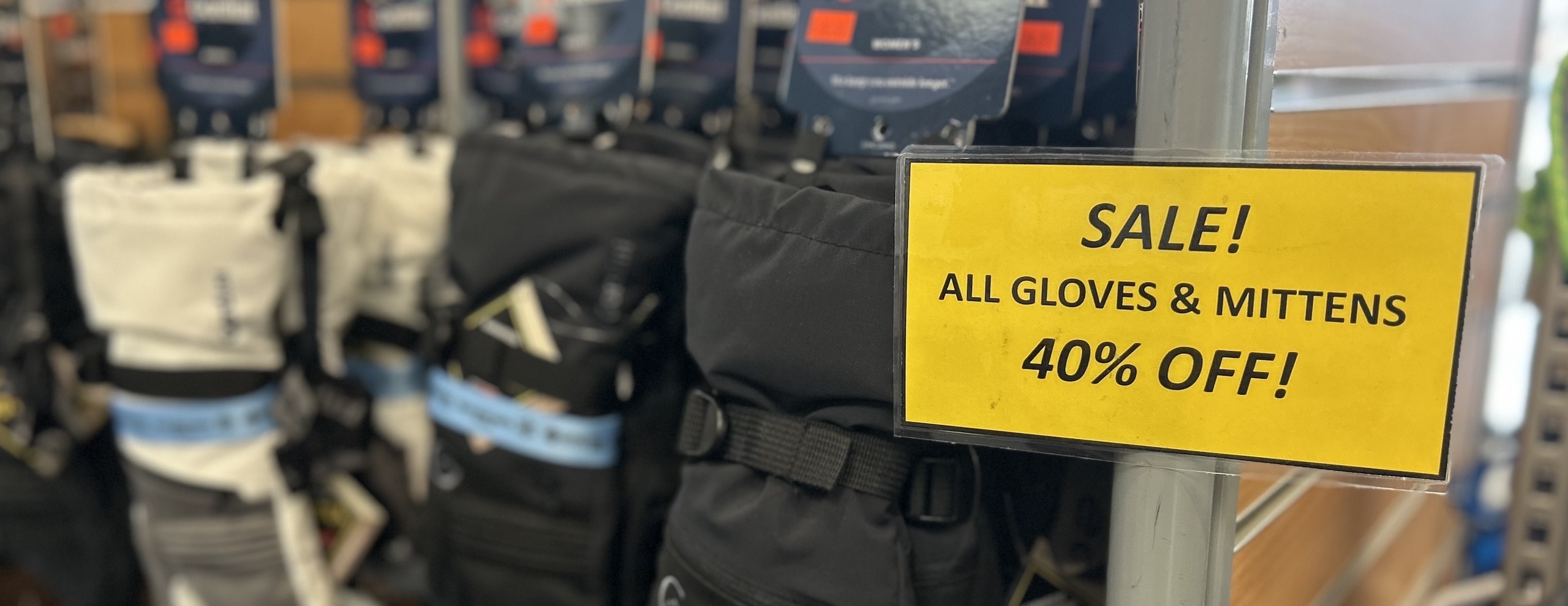 Retail rack with "Spring Special" sale sign